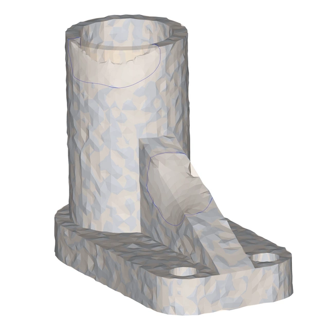 The two parts have been aligned. The CAD part is transparent so the worn region on the scanned part can be clearly seen, as can the polycurve boundaries of the worn regions.